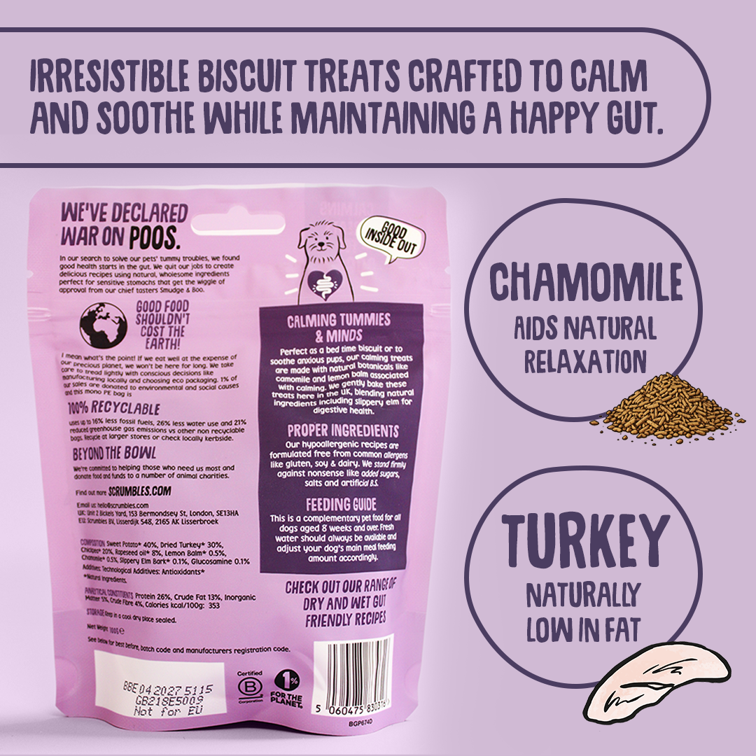 Dog biscuit packaging with text about calming treats, chamomile, and turkey ingredients on a purple background.